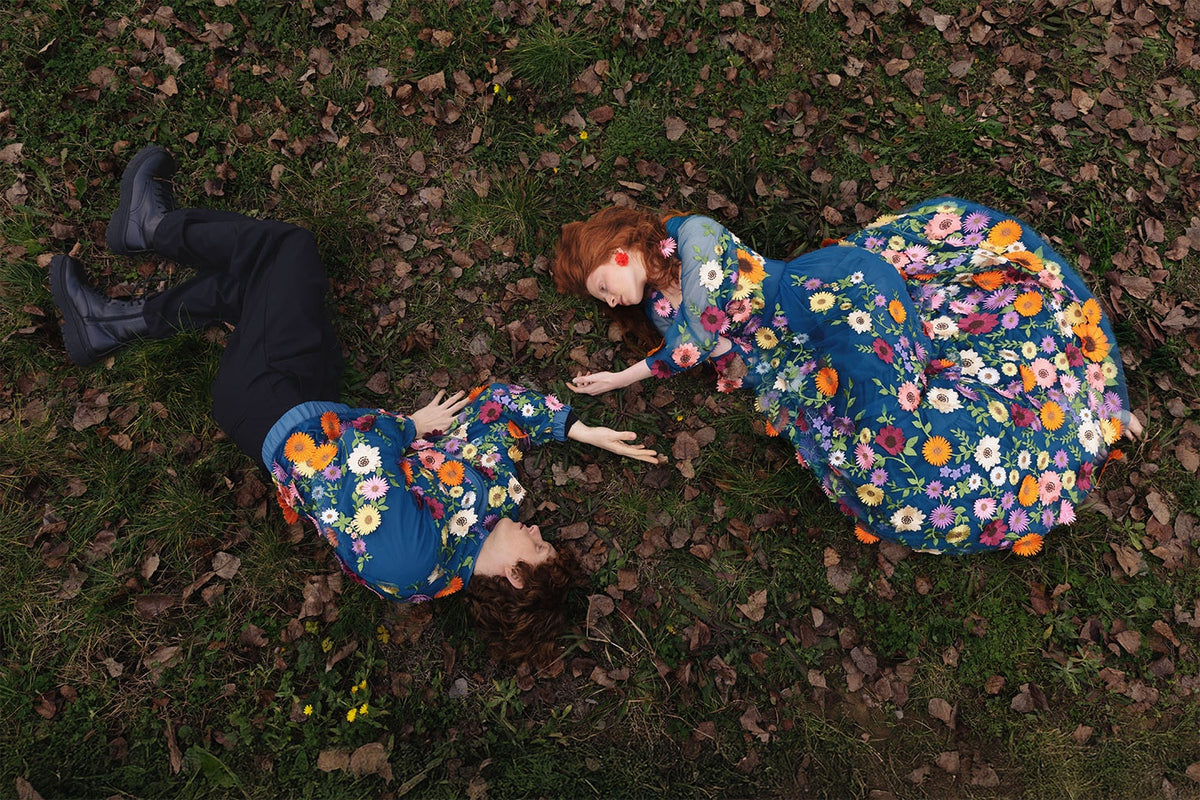 Blue floral embroidered dress worn by a model.