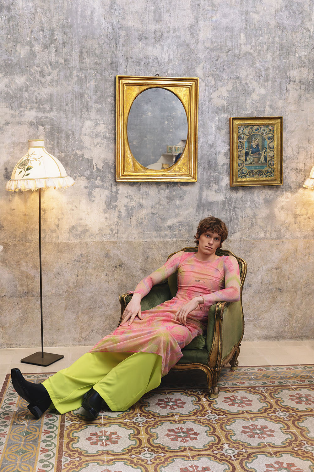 Pink printed sheer dress with long sleeves worn by a model.