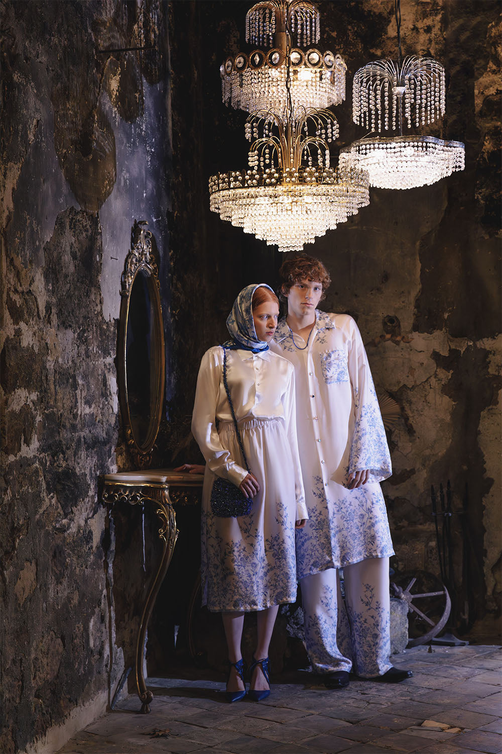 Ivory long shirt with blue floral details worn by a model.