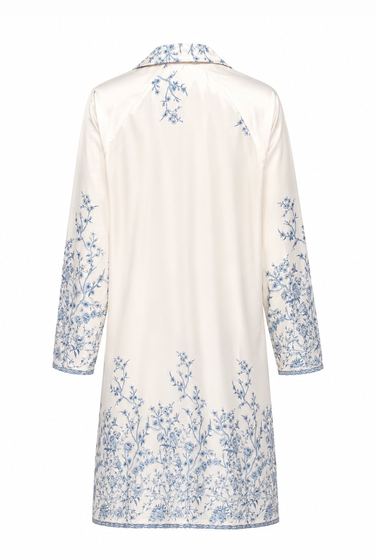Ivory long shirt with blue floral details, back view.