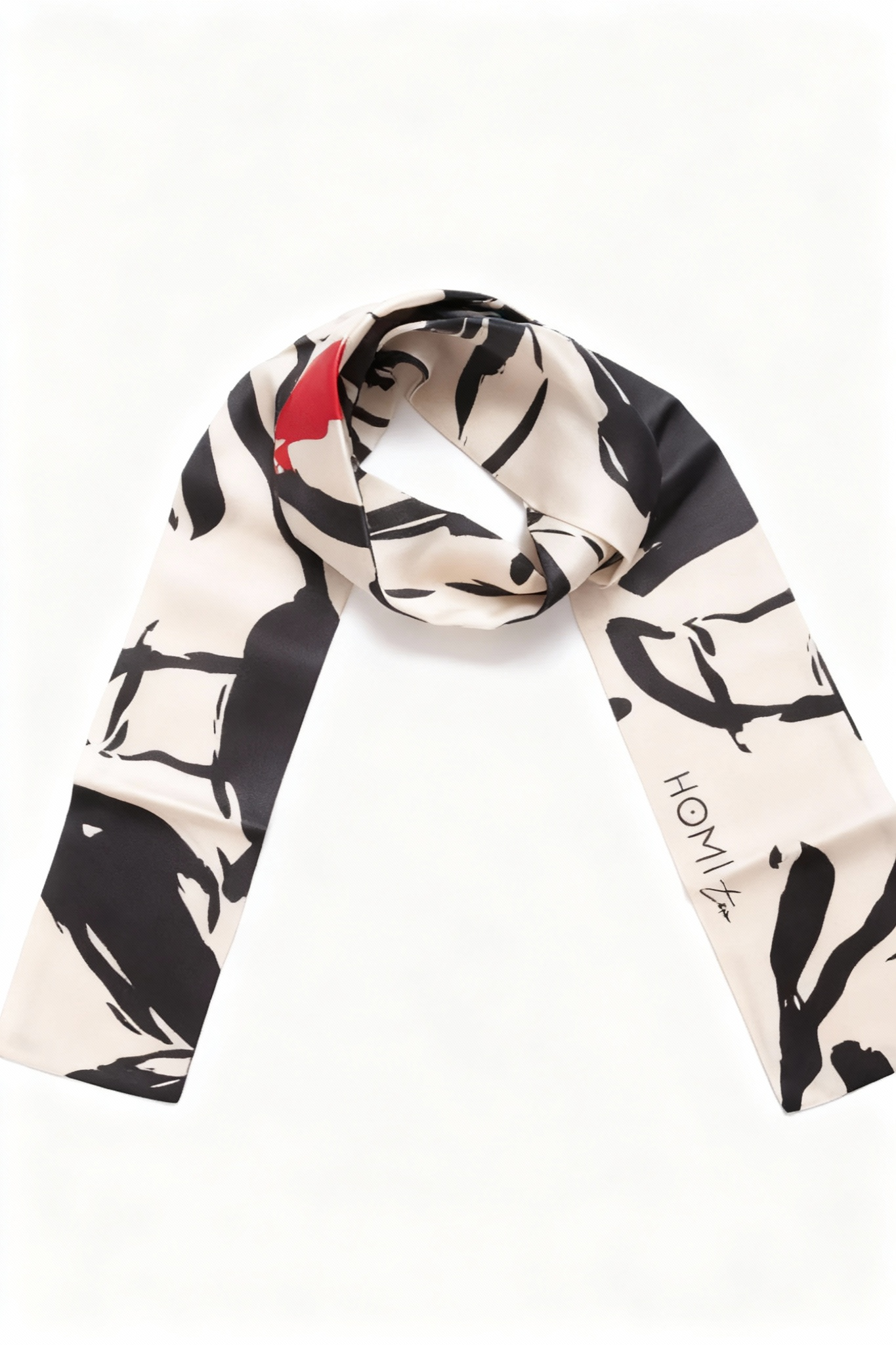 130×8 cm silk scarf with black, white and red graphic motif.
