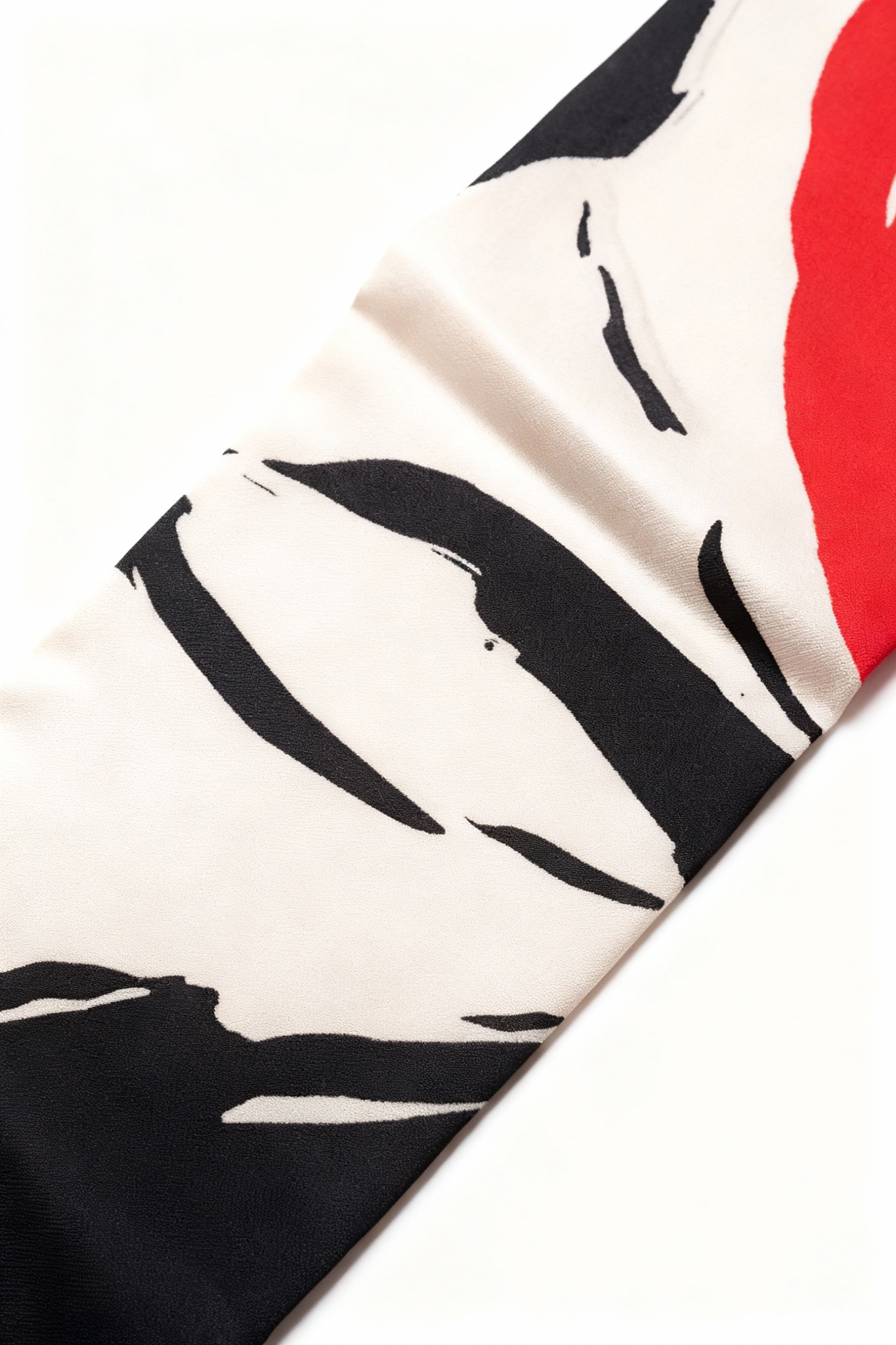 Close-up of the black, white and red graphic motif.
