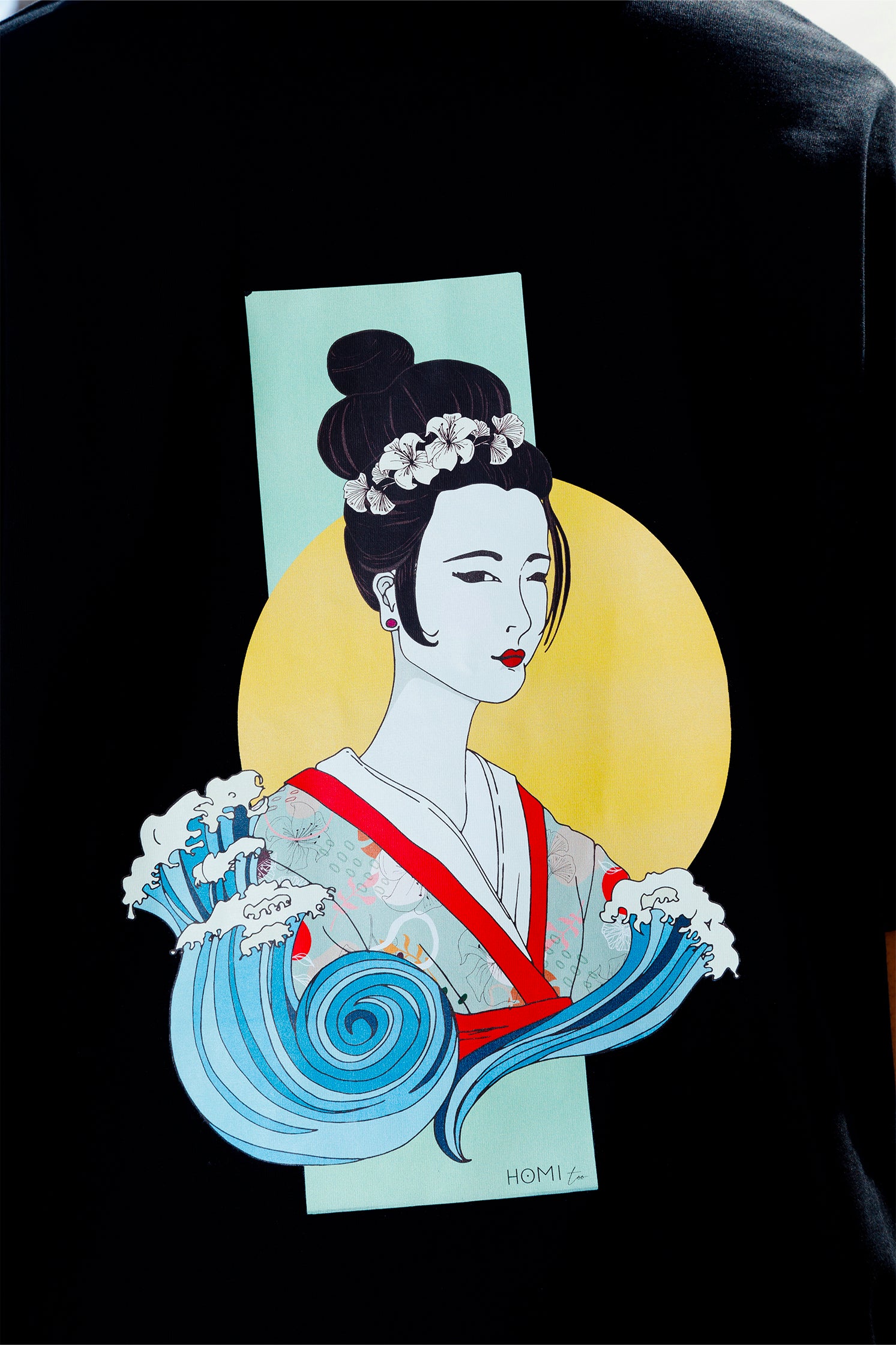 Close-up of the hand-painted Geisha graphic on the back of the black short-sleeved oversized t-shirt, showing intricate details, vibrant colors, and original artwork.