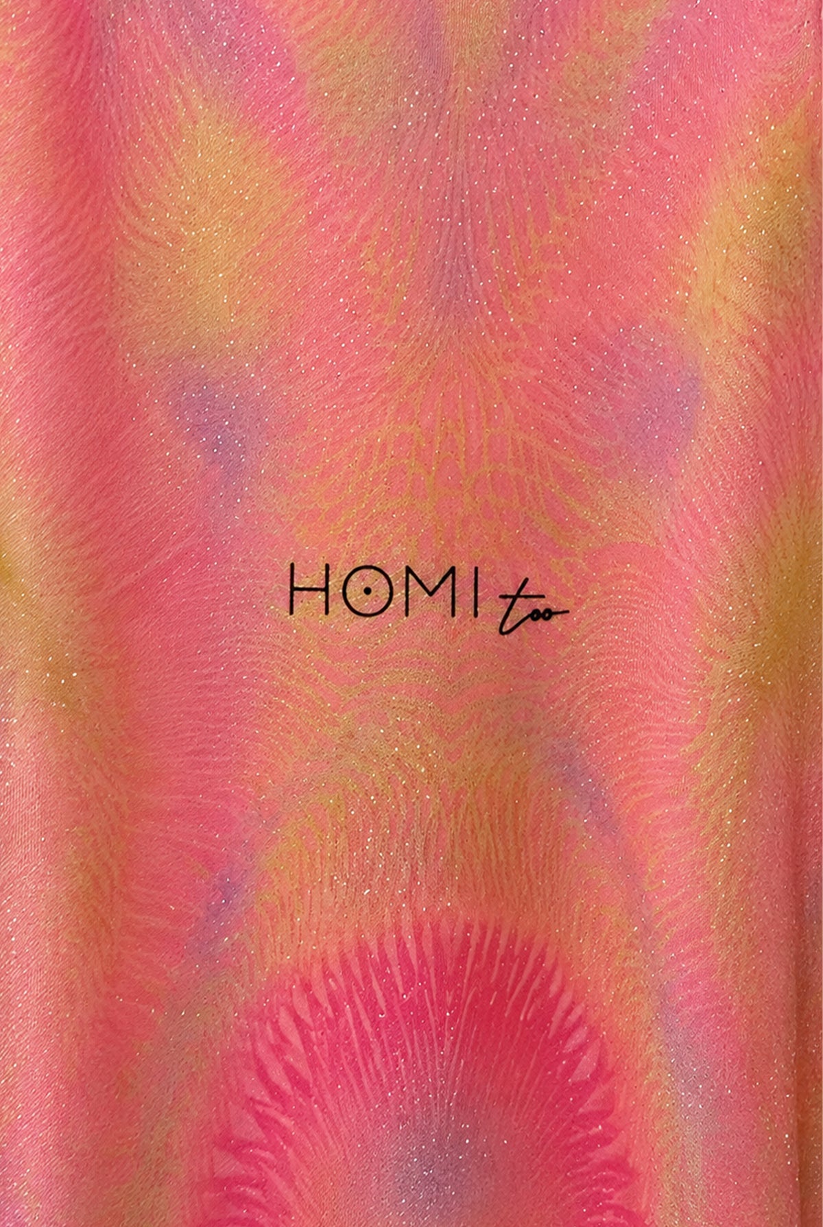 Close-up of the colorful print on the pink sheer dress.