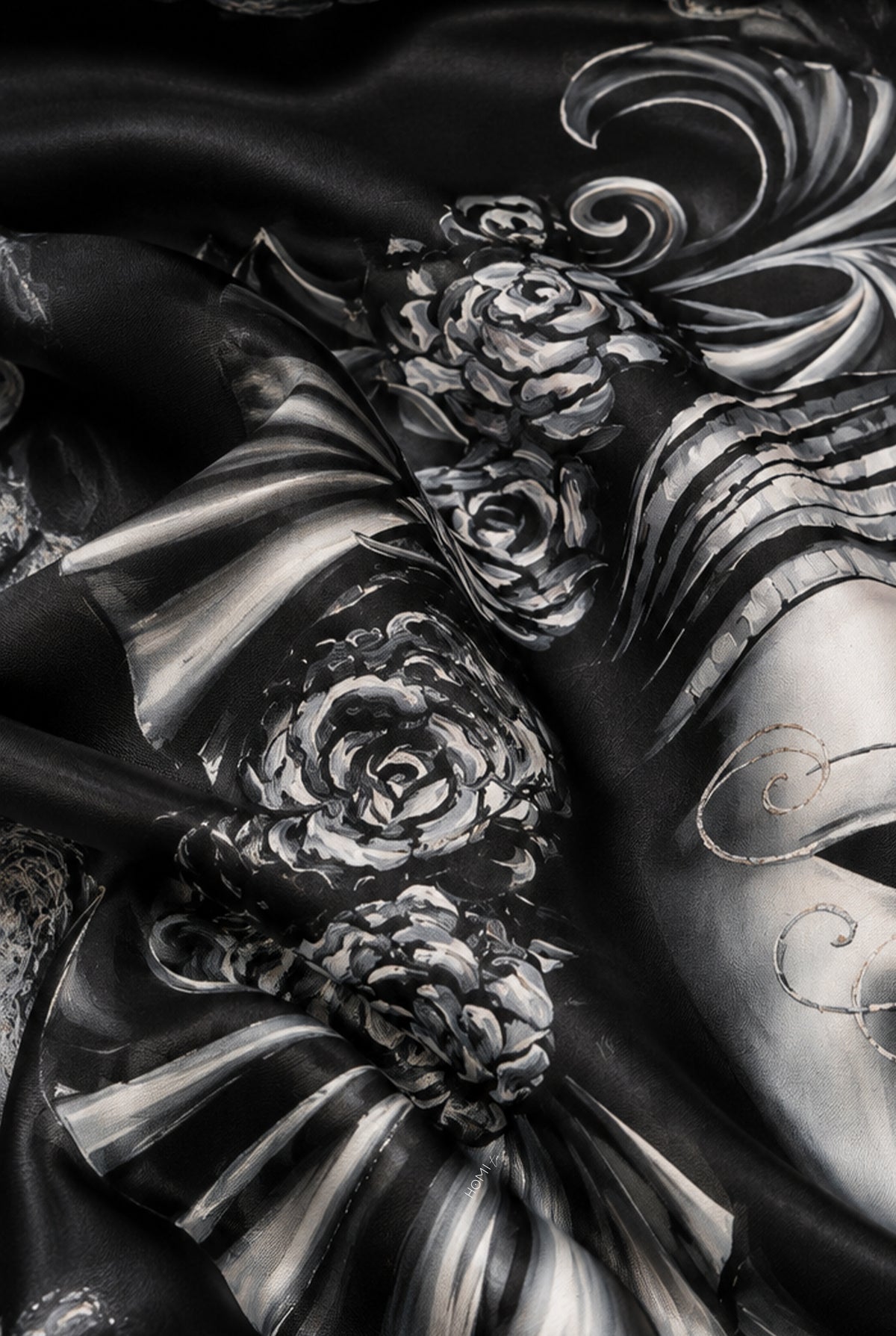 Close-up of the silk scarf, highlighting the detailed Venetian mask, floral elements and sculptural motifs.