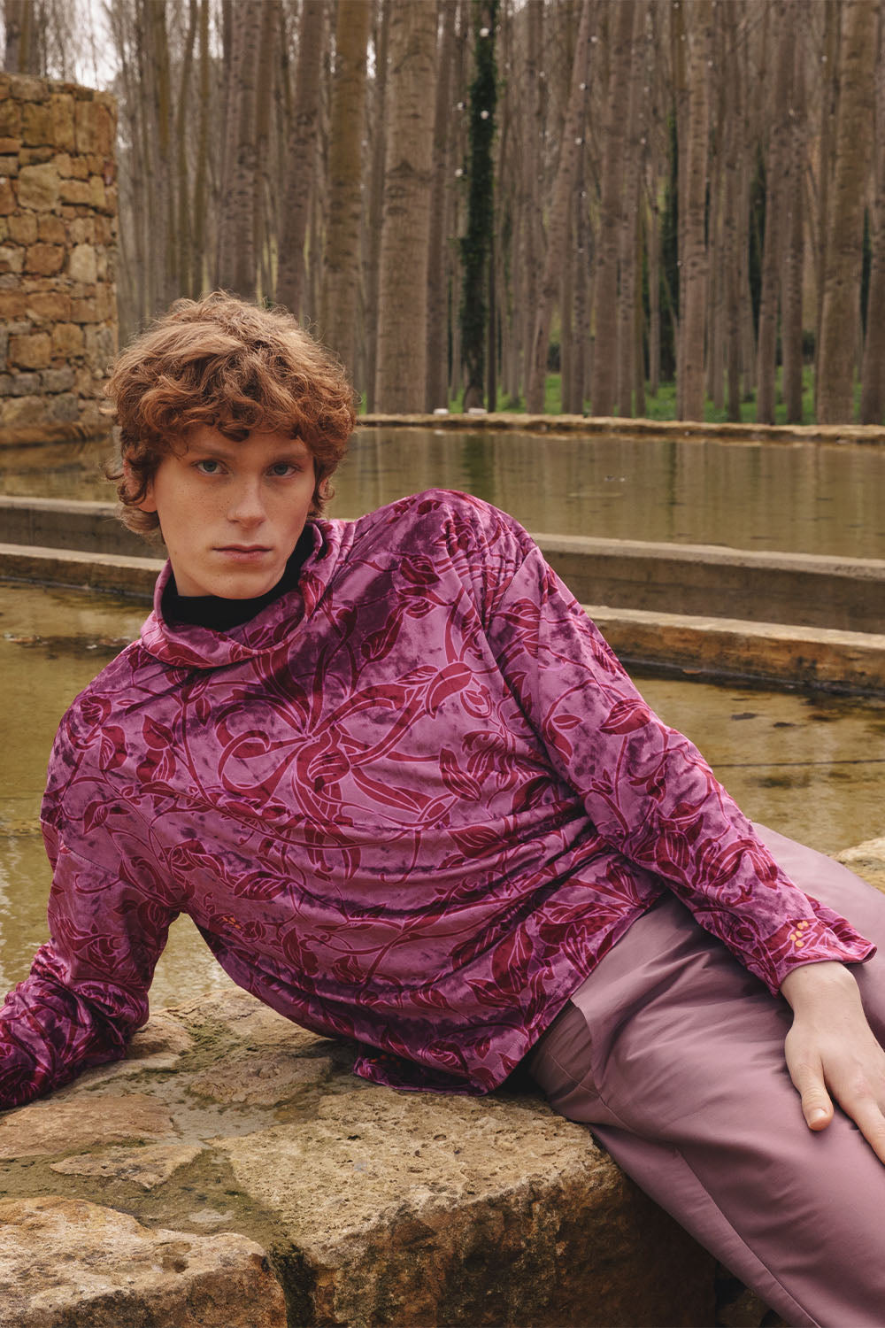 Velvet floral print top with cowl neck worn by a model.