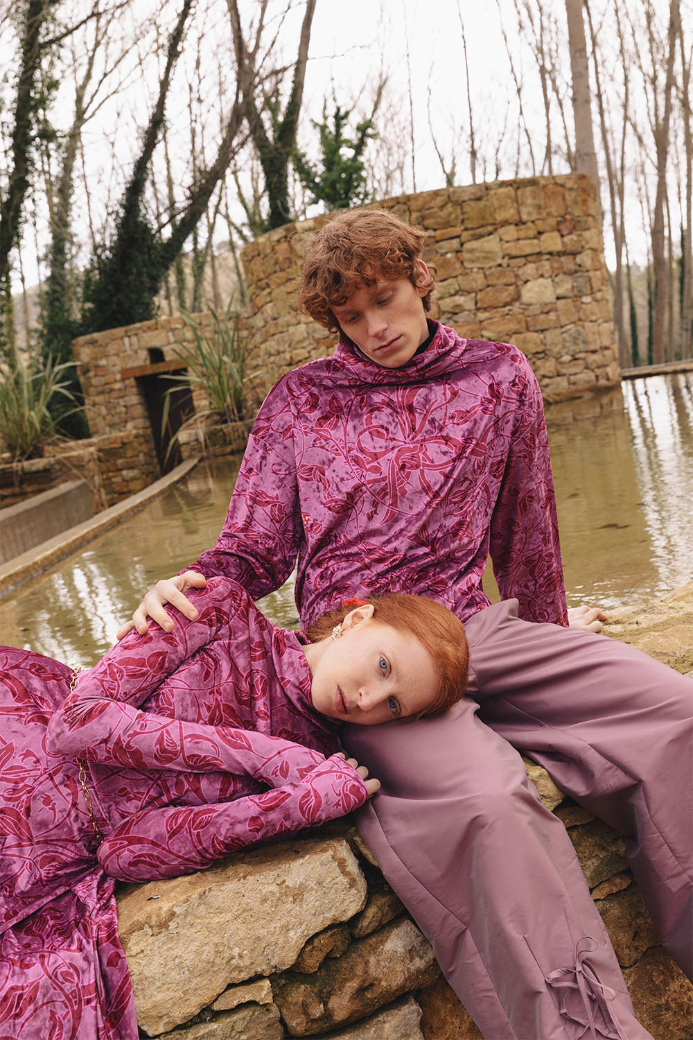 Velvet floral print top with cowl neck worn by a model.
