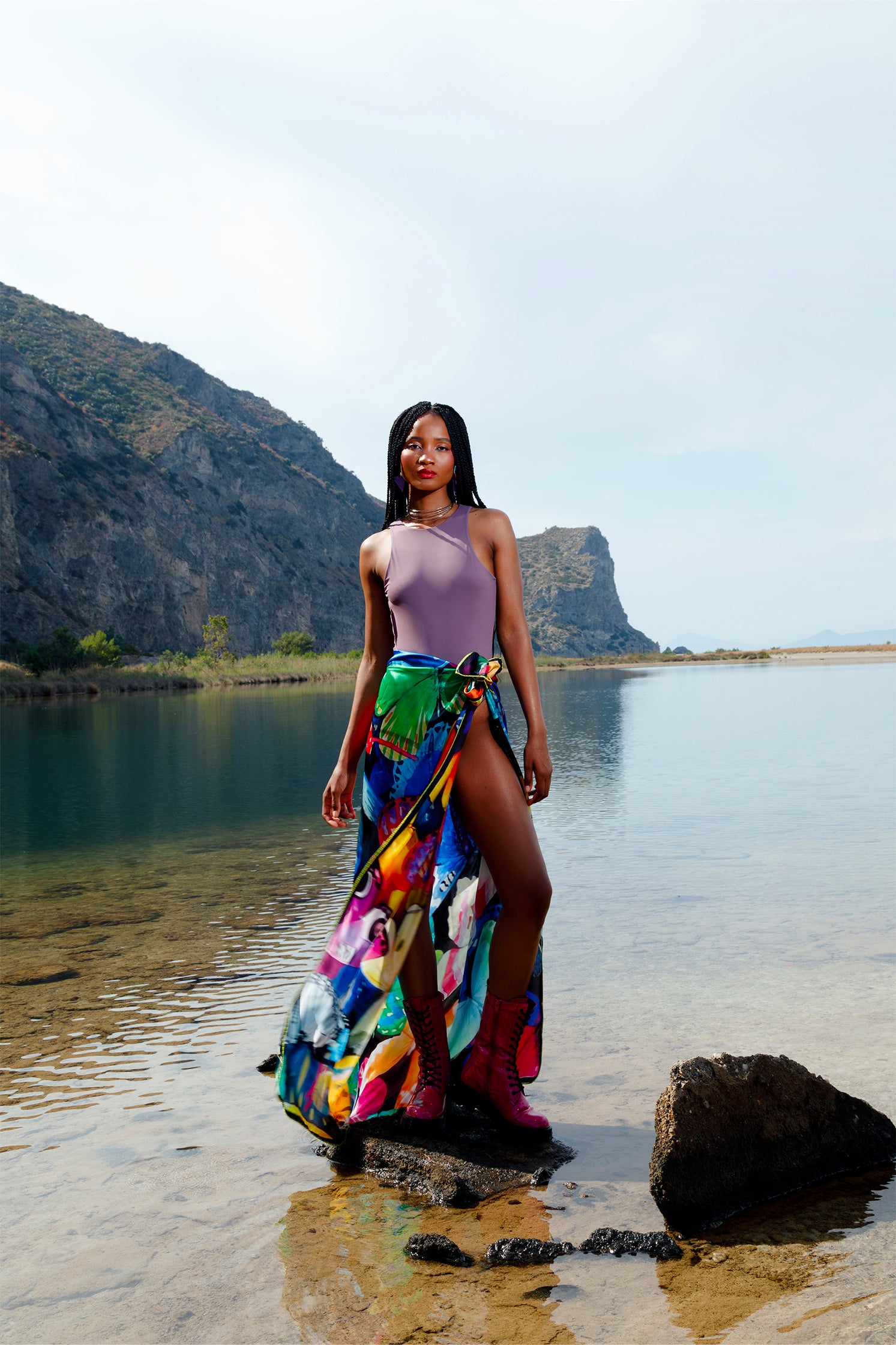Large pure silk scarf with artistic butterfly print worn as a skirt by a model, showing its versatility and flowing fabric.
