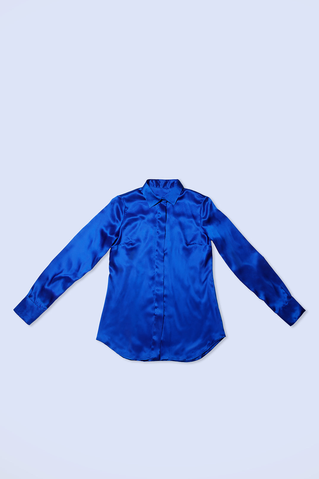 Deep blue silk shirt, fluid and lightweight.
