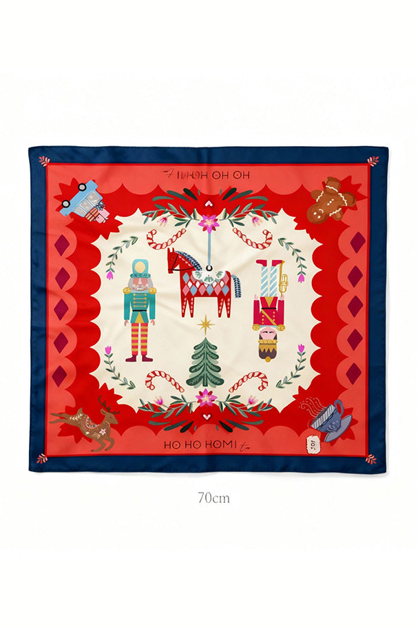 Christmas-themed scarf with winter-inspired motifs in red, green and blue tones, lightweight and fluid fabric.
