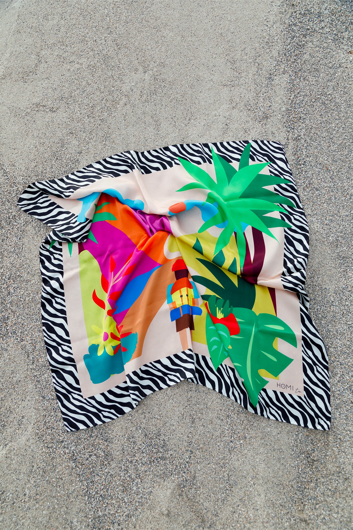 Pure silk scarf, 90x90 cm, featuring a colorful stylized mountain landscape framed by a bold zebra-striped border.