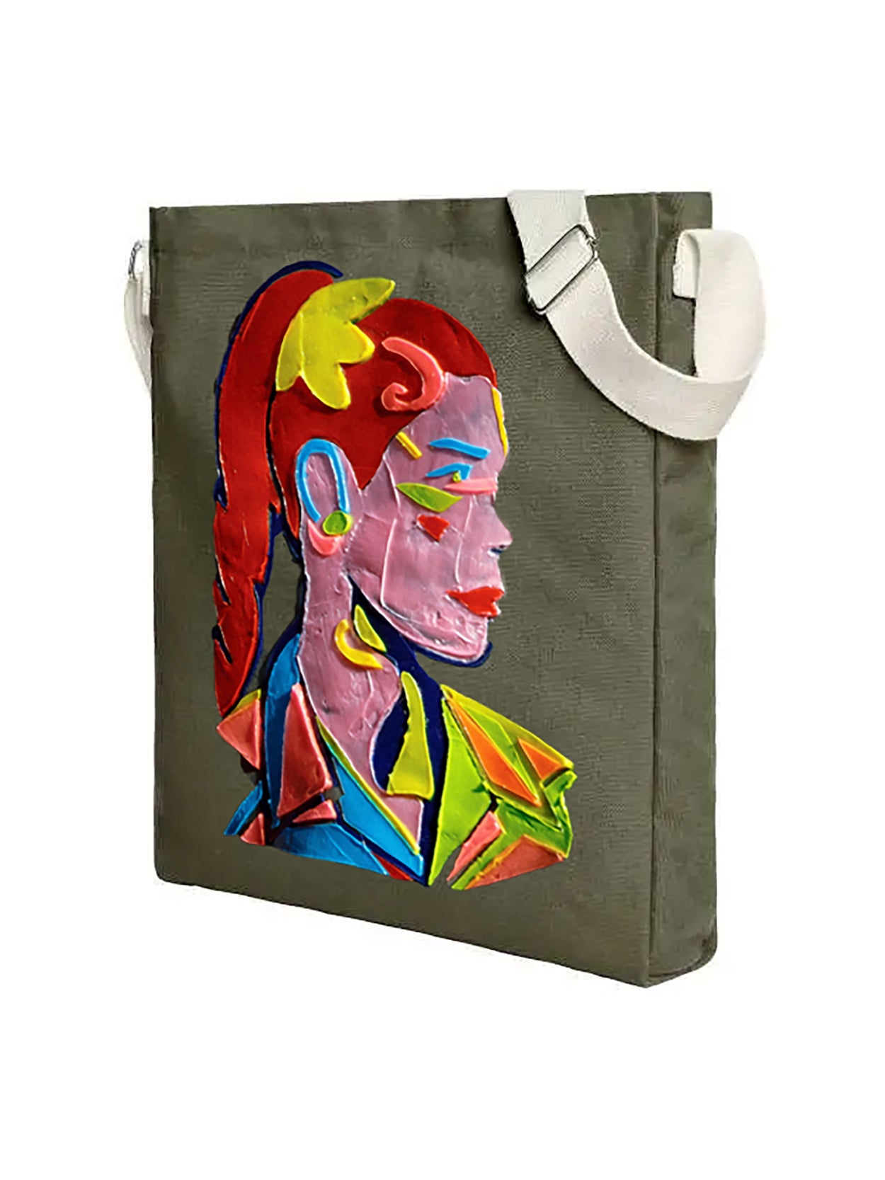 Side view of the olive green shopper bag made of soft fleece fabric featuring a hand-painted face print using an exclusive silicone and pigment technique, dimensions 40x65 cm.